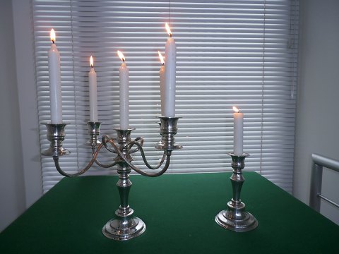 One pair of new silver plated five armed candlesticks. England approximately 
1880.