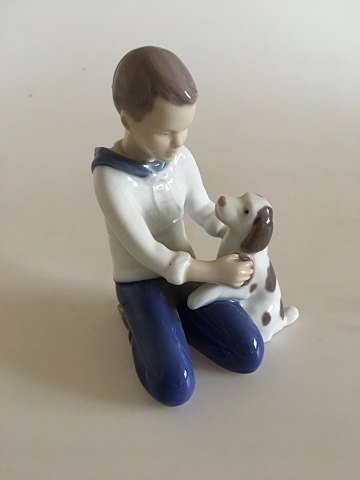 Bing & Grondahl Figurine of Boy Brushing His Dog No 2334.