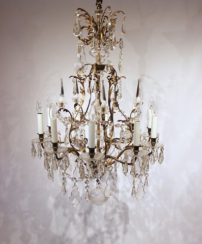 Large antique french 
chandelier from the around the 1920s.
5000m2 showroom.