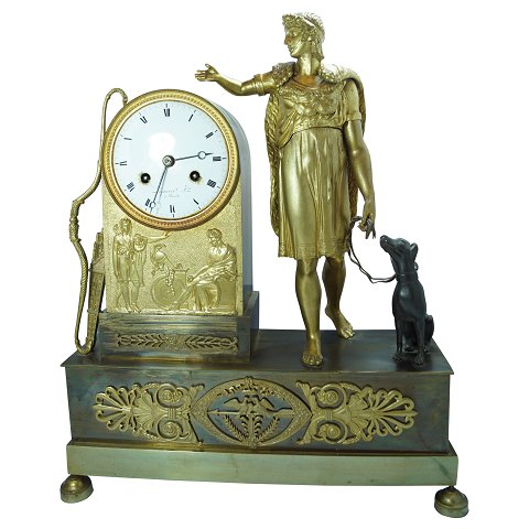 A French clock of gilt bronze, empire around 1820