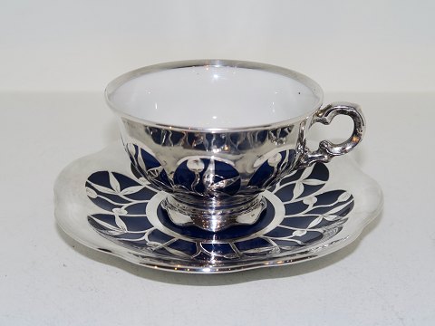 Hutschenreuther 
Dark blue demitasse cup with silverplate decoration