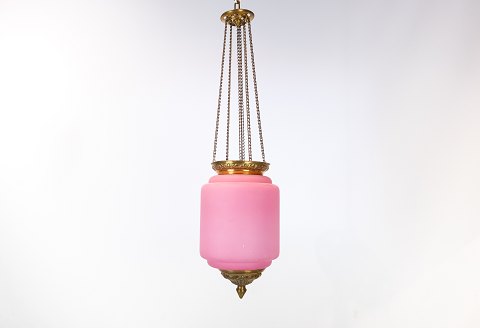Antique pendant of pink opaline glass with brass edge and suspension from around 
1860.
5000m2 showroom.