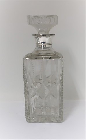 Kronen. Carafe with silver mounting (925). Height 20 cm.
