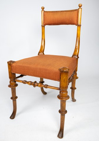 Dining chair of mahogany and upholstered with red fabric from the 1890s.
5000m2 showroom.
