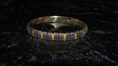 Elegant bracelet 14 carat Gold
Stamped 585
Measures 60.63 * 55.96 mm dia
Height 8.24 mm