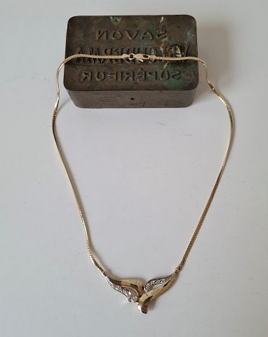 Vintage collier i 14 kt guld med zirkoner