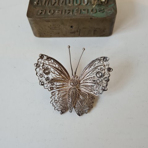 Large silver filigree brooch in the shape of a butterfly