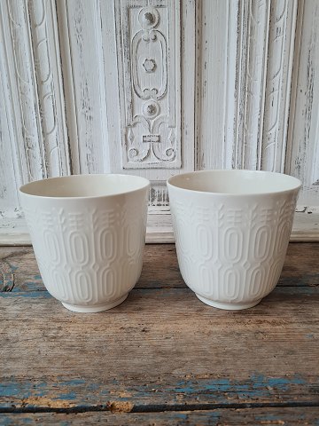 Royal Copenhagen - pair of flower pots in Blanc de Chine decorated with a 
geometric pattern in relief designed by Thorkild Olsen no. 4133