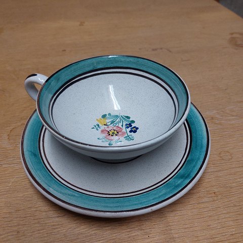 Tea cup and saucer in pottery from Lars Syberg
