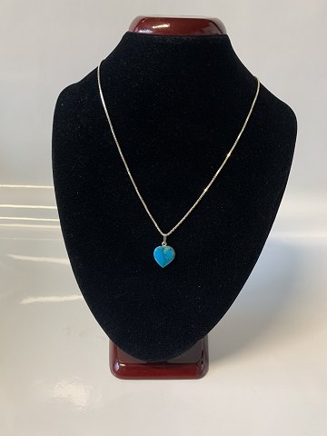 Silver necklace with pendant in turquoise
Stamped 925S, length 42 cm.