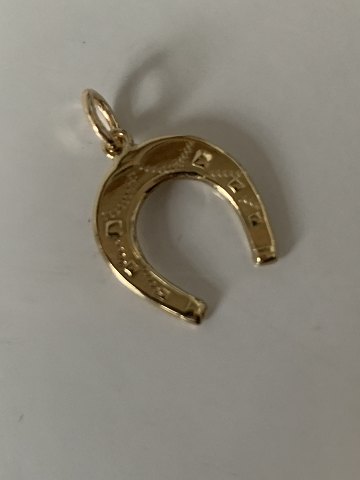 Pendant 14 carat gold, designed as a Horseshoe. Classic pendant.