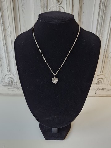 Georg Jensen necklace in sterling silver with pendant in the shape of "Faith, 
Hope & love"