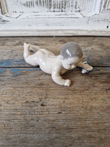 Royal Copenhagen figurine, baby with sock no. 1739