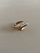 Georg Jensen 18K Delvist Rhodineret Guldring prydet med ti brilliantslebne 
diamanter