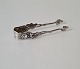 Sugar tongs in silver