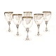 A set of 6 sterlingsilver wine goblets by Harald Nielsen for Georg Jensen. 
#532A. H: 12,5cm. W: 766gr