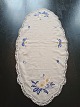 Table runner embroidered with Christmas rose