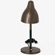 Vilhelm Lauritzen / Louis Poulsen
Table lamp in patinated brass and green fluted handle.
1 pc. in stock
Original condition
