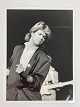 Original black and white press photo of George Michael of Wham during the 
latter
