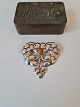 Art Nouveau brooch in silver with amber pearl