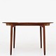 Ejner Larsen & Aksel Bender Madsen / Willy Beck
Round dining table in teak with three additional plates. Label from master 
cabinetmaker.
1 pc. in stock
Good, used condition
