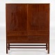Danish Master Carpenter
Cutlery cabinet in mahogany with four drawers, two doors and pull-out trays. 
Interior of maple.
1 pc. in stock
Good, used condition
