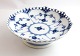 Royal Copenhagen. Blue fluted, full lace. Small round bowl on foot. Model 1023. 
Height 6 cm. Diameter 17,5 cm. (1 quality)
