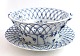 Royal Copenhagen. Blue fluted, full lace. Round fruit bowl with saucer. Model 
(1050 + 1099). Diameter of the bowl is 18.5 cm. Height 8.5 cm. Diameter of 
saucer 23.5 cm. (1 quality)