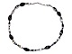 Modern silver
Necklace with black stones