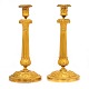 Ein Paar feuervergoldete Bronzenleuchter. Frankreich um 1810-20. H: 31cm