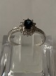 Gold ring in 14 carat white gold, with diamonds and blue sapphire. Size 52.