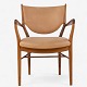 Finn Juhl / Niels Vodder.
NV 46 - Rare armchair in solid walnut and patinated natural leather. Designed 
in 1946. Stamped manufacturer.
Literature: Grete Jalk: ‘Danish Furniture Art Through 40 Years’, 2nd volume, 
pages 320-321.
1 pc. in stock
