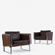 Hans J. Wegner / Johannes Hansen.
JH 801 - Et par lænestol i originalt, brunt læder med stel i metal.
1 sæt på lager
