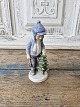 Royal Copenhagen Christmas figurine 2002 Boy with Christmas tree no. 032