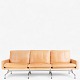 Poul Kjærholm / E. Kold Christensen.
PK 31/3 - 3-seater sofa in patinated light natural leather with a chrome-plated 
steel frame. Designed in 1958.
1 pc. in stock

