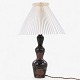 Axel Salto
Table lamp in stoneware decorated with reddish brown glaze and olivine glaze 
with new pleated shade. Designed in 1944. Signed.
1 pc. in stock
