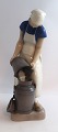 Bing & Grøndahl. Porcelænsfigur. Pige med mælkejunge. Model 2181. Højde 21,5 cm. 
(1 sortering).