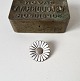 Marguerite brooch in silver and enamel