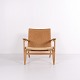 CH25 Lounge Chair in Patinated Solid Oak and Woven Paper Cord by Hans J. Wegner