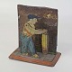 Antik mekanisk legetøj Brolægger12 cm