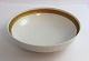 Royal Copenhagen. Vifte med guld. Rund skål. Model 11525. Diameter 17,5 cm. Højde 4,7 cm. (1 sortering)