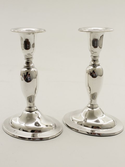 A pair of silver candlesticks