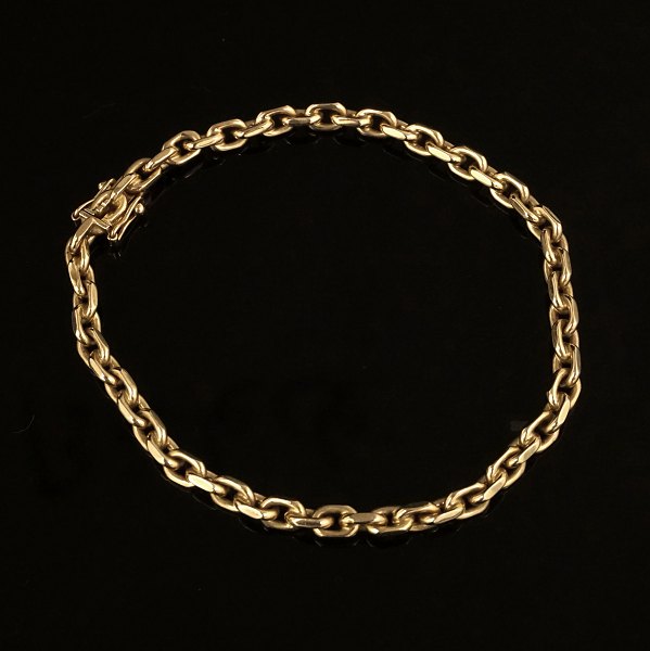 Anker armbånd i 14kt guld. Ledstørrelse: 6x4mm. L: 19,5cm. V: 12gr