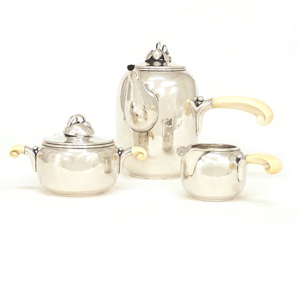 Holger Rasmussen, Denmark, silver coffee service. Ivory handles. Denmark circa 
1940. H: 16cm. Weight all pieces: 672gr