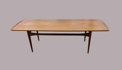 Coffee table
France & Daverkosen
Teak
L: 150 cm, W: 52 cm, H: 47 cm
Used, but good condition. Minor repair has been made.
Tove og Edvardt Kindt Larsen, designed in 1955
1
