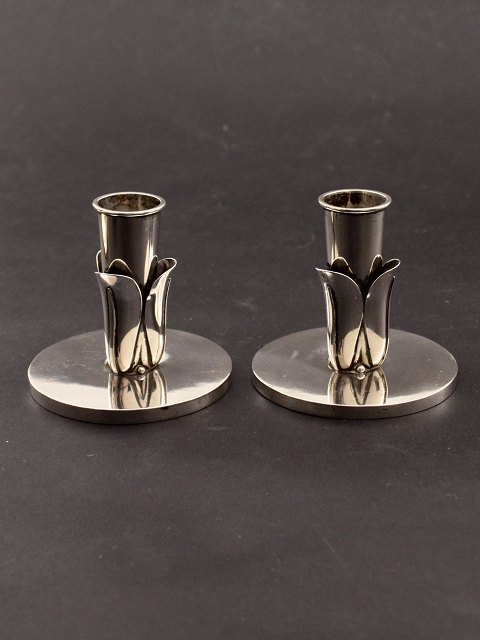 A pair of handmade 830 silver art deco candlesticks