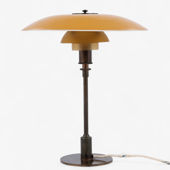 Poul Henningsen / Louis Poulsen
PH 3.5/2 - Table lamp in burnished brass with upper shade in yellow-lacquered 
copper and middle and lower shade in amber glass. Stamped 
